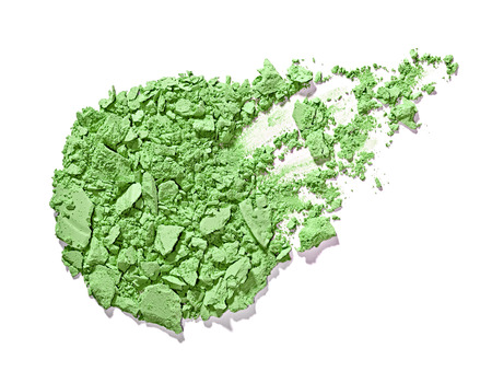 close up of  a make up powder and a brush on white backgroundの写真素材