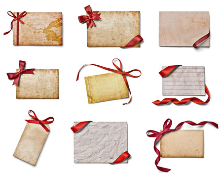 collection of various note cards with ribbon bow on white background. each one is shot separatelyの写真素材