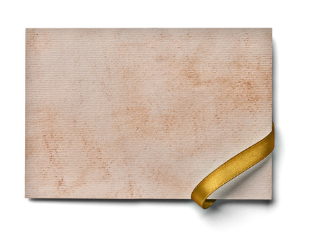 close up of a  note card with ribbon bow on white backgroundの写真素材