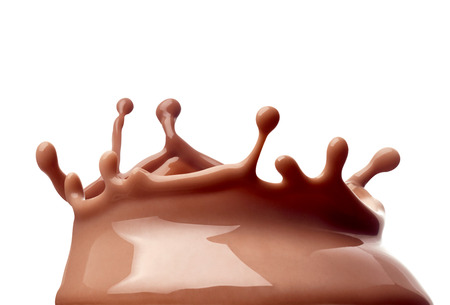 close up of a chocolate milk splash on white backgroundの写真素材