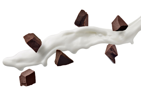 close up of a chocolate pieces and milk  on white background