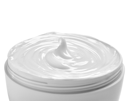close up of  a white beauty cream in a container on white backgroundの写真素材