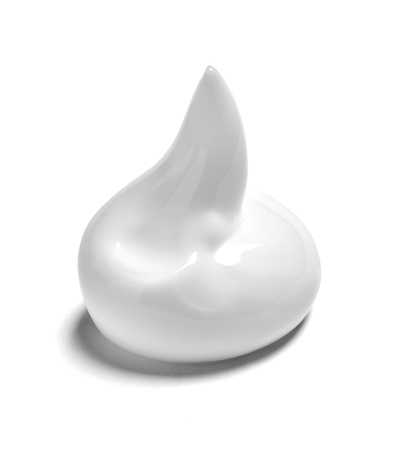 close up of  a white cream sample on white background