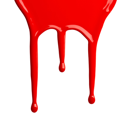 close up of paint leaking down white backgroundの写真素材