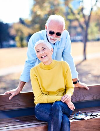 portrait of happy smiling senior couple outdoors