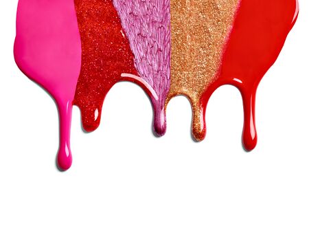 close up of  a nail polish leaking on white backgroundの写真素材