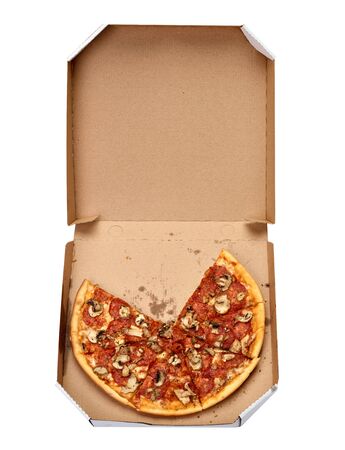 close up of a pizza in the box on white backgroubdの写真素材