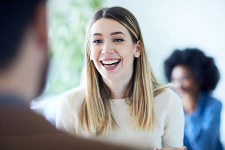 Portrait of young business woman in the officeの写真素材