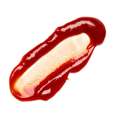 close up of  a ketchup stain on white backgroundの写真素材