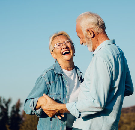 Happy active senior couple outdoorsの写真素材