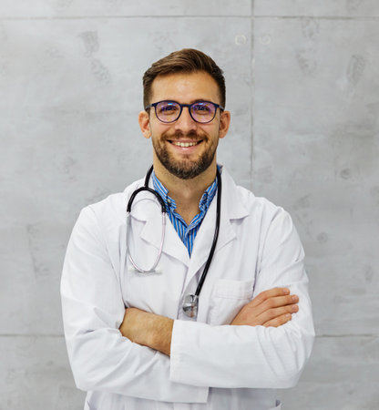 portrait of a young doctor in his office in a hospitalの写真素材