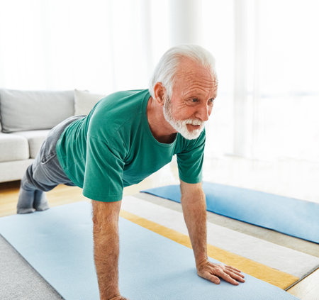 Senior man exercise stretching yoga at home health careの写真素材