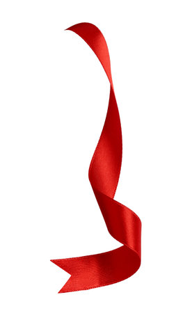 close up of a red ribbon bow on white backgroundの写真素材