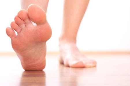 woman's foot, bare Foot stepping