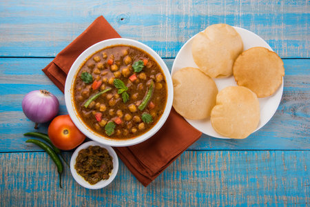 Chole puri or chana masala with fried poori