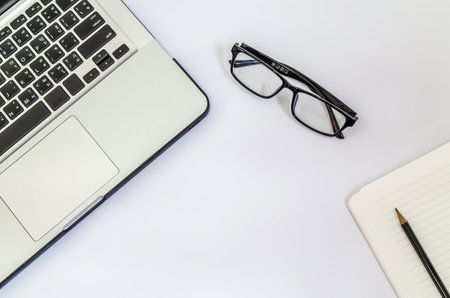 Computer for work and white backgroundの写真素材