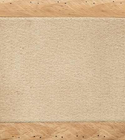 Old fabric in wooden frameの写真素材