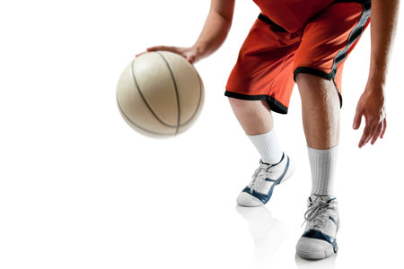 Basketball player in action, motion isolated on white background. Close-up.の写真素材