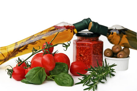 Oil Olive with vegetables and condimentsの写真素材