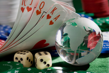 playing card chips, dice, and globe
