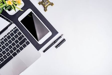 Workspace office desktop with office accessories. Desktop with notebook, pen, cup of coffee and...