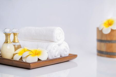 Spa treatment concept. Spa background with spa accessories on white background.の写真素材