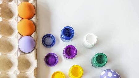 Preparing for painting eggs for Eastertime at home. Happy Easter day.