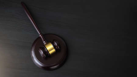 Judge's gavel on black table in courtroom. Justice, Law, Attorney and Court judge concept.の写真素材