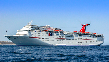Cabo San Lucas / Mexico - October 13, 2007: Panoramic view on the cruise ship, anchored near the shore, clean blue sky, sunny day.のeditorial素材