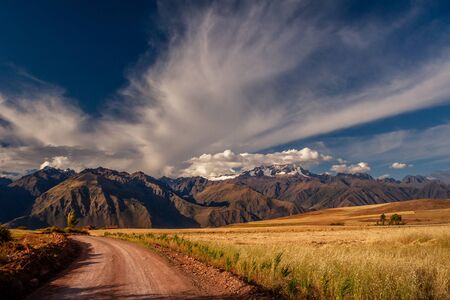 View on the Andes mountains near the Cusco city in Peru. Mountain peak covered with snow and...