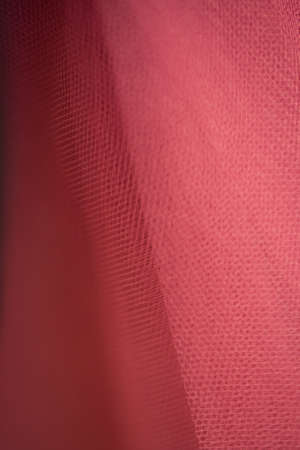 Selective focus, close-up, macro, abstract, full frame pink, magenta tulle fashion nettingの写真素材