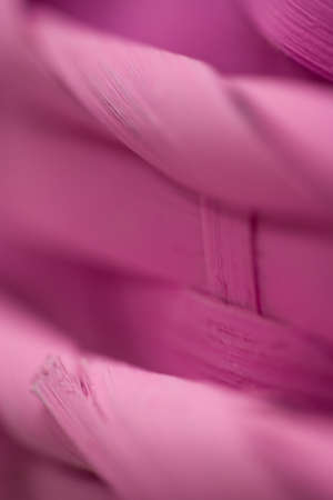 Pink Easter Baskets â close-up, selective focus, abstract background texture of stacked wooden Easter basketsの写真素材