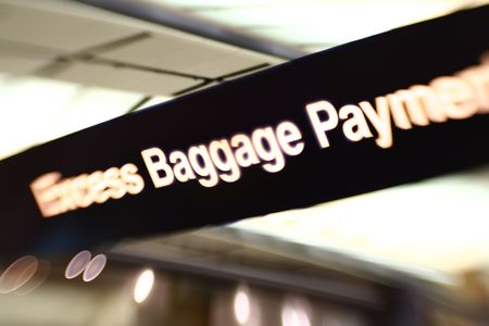 Airport scenes background series. Excess baggage counter. Shot with a special effect  lens. Intentional selective focus & blur.の写真素材