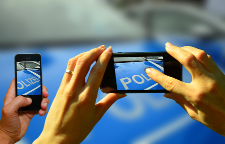 sightseers photograph firefighters during deploymentの写真素材