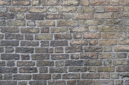 A wall with the detail of the bricks as a backgroundの写真素材