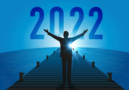 Hope 2022 greeting card with an optimistic businessman raising his arms to a new year that heralds...