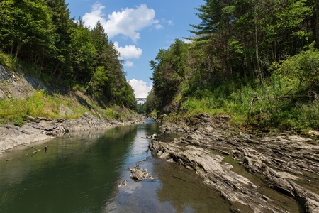 This is a view of the Ottauquechee River flowing through the Quechee Gorge State Park の写真素材