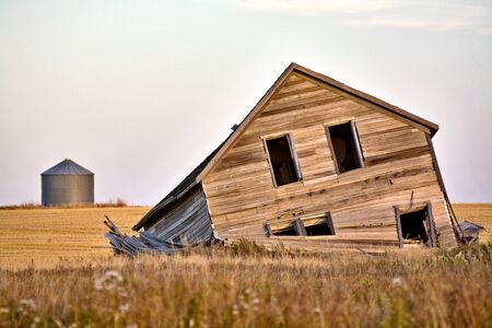 Abandoned Farmhouse at sunset Saskatchewan Canadaの写真素材