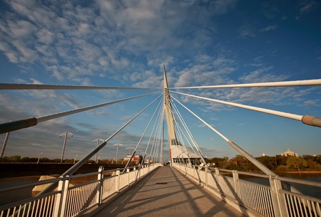 Unique walkway bridge over the Red River in Winnipegのeditorial素材