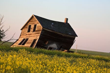 Weathered old farm house in scenic Saskatchewanの写真素材