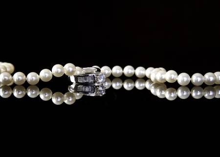 Jewelry on black satinの写真素材