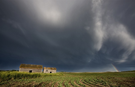 Abandoned Farm house with stormy cloudsの写真素材