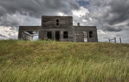 Abandoned Farmhouse Saskatchewan Canada sunset and prairie view