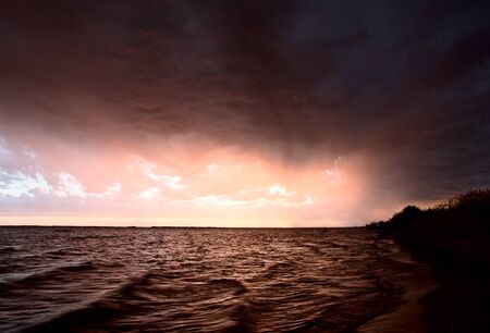 Storm over Lake Diefenbaker Saskatchewan Canada sunsetの写真素材