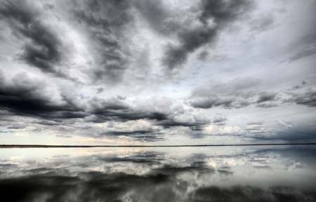 Saskatchewan Lake Reflection Chaplin Canada cloudsの写真素材