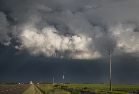 Storm Clouds Saskatchewan billowing clouds and gravel road