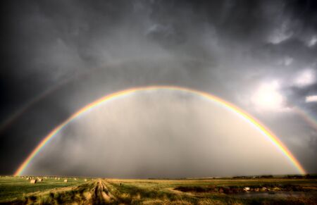 Storm Clouds Saskatchewan rainbow in prairie Canadaの写真素材