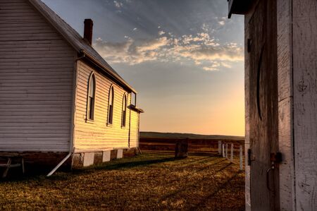 Storm Clouds Saskatchewan with country church at sunsetの写真素材