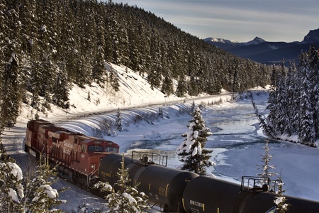 Rocky Mountains in Winter Bow River Train tracksのeditorial素材