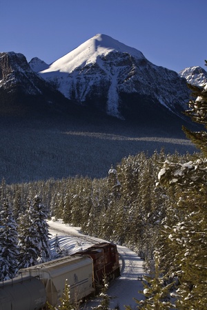 Rocky Mountains in Winter Bow River Train tracksのeditorial素材